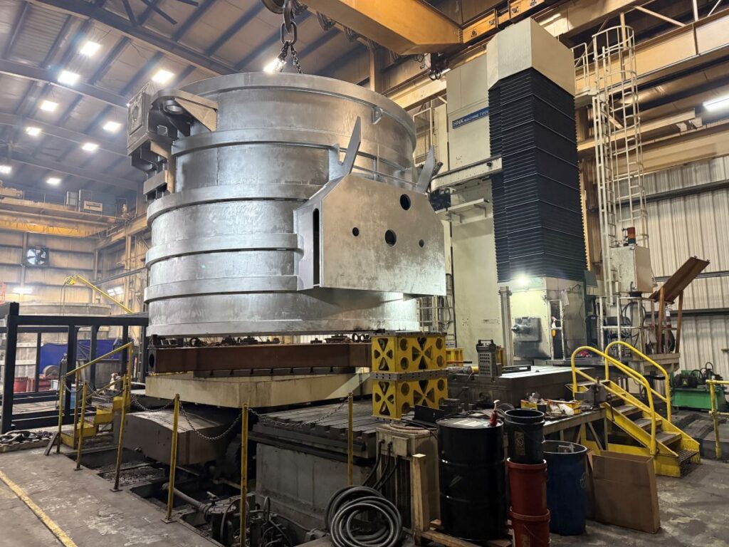 HNK CNC vertical turning lathe machining a large steel ladle at Brilex